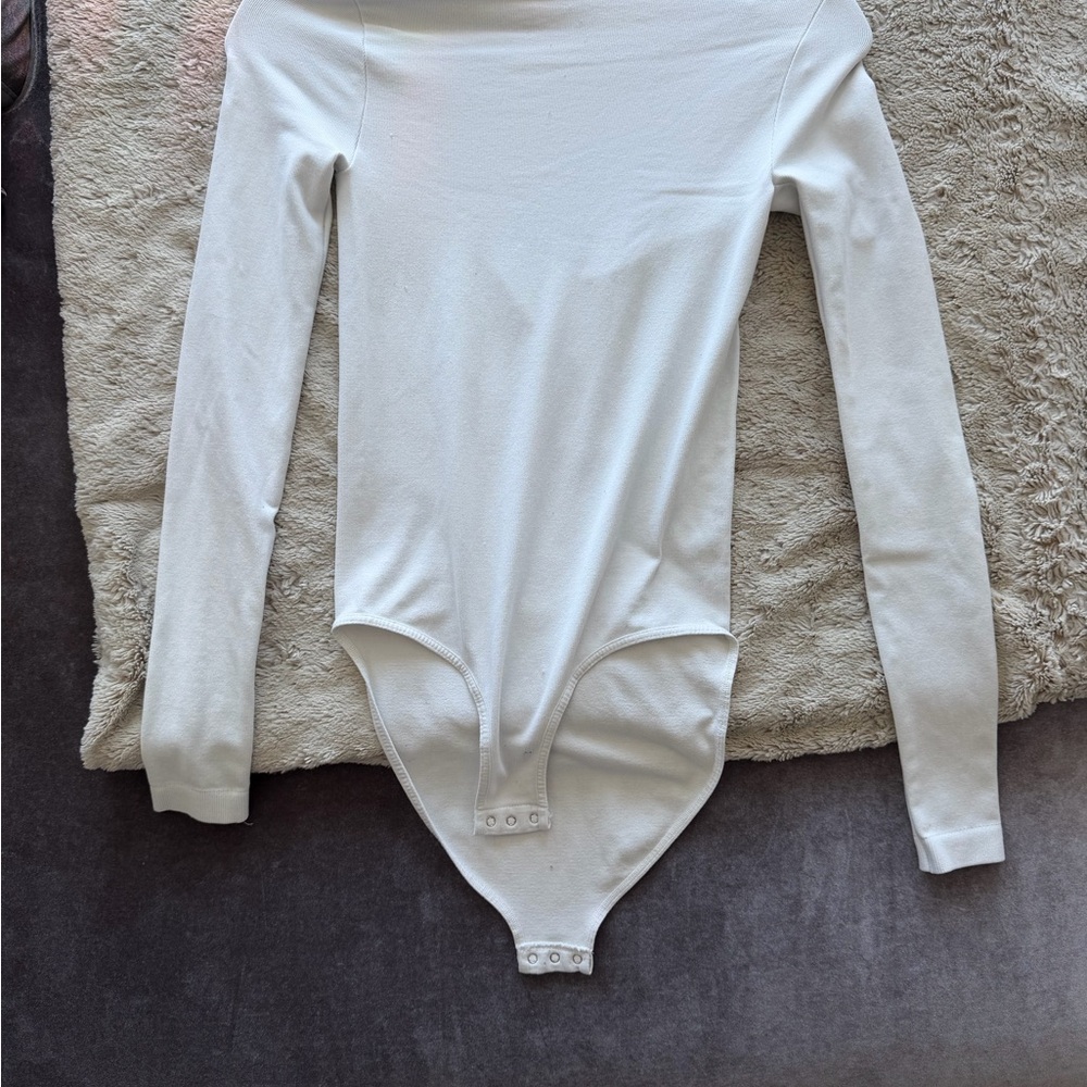 Free People White Long Sleeve Bodysuit with Snap Closure
